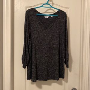 Reitman’s navy top with button up sleeves